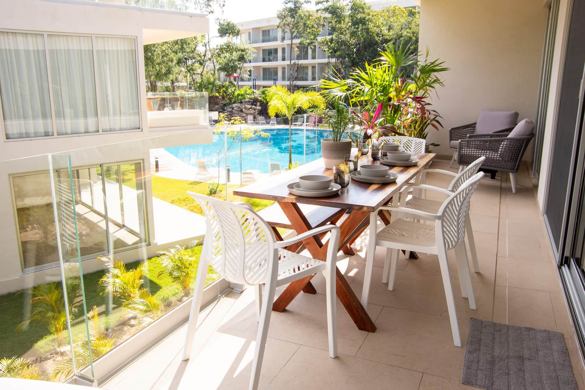 Private balcony amenity overlooking the pool at The Leaf Playacar
