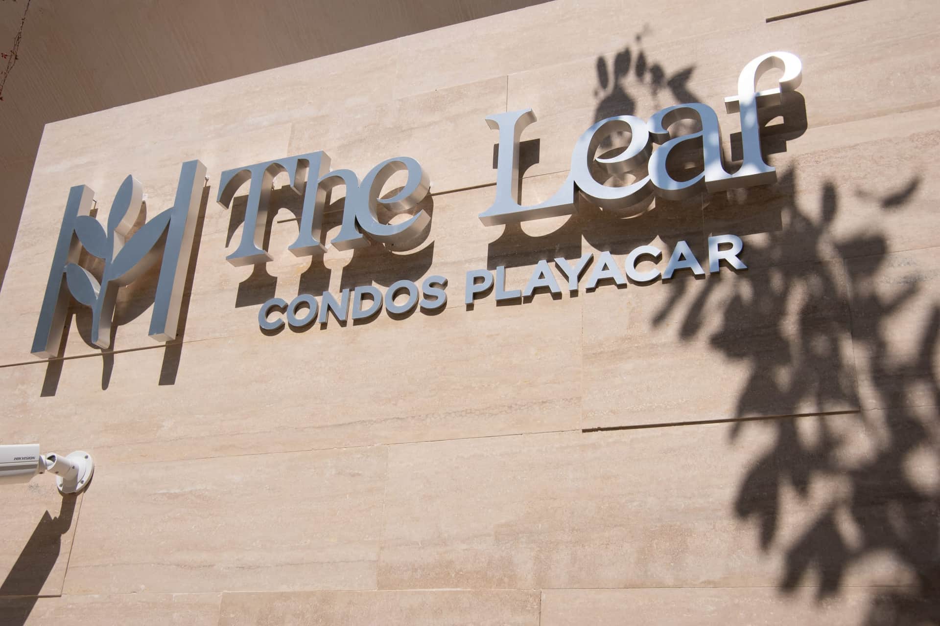 The Leaf Condos Playacar branded entrance signage